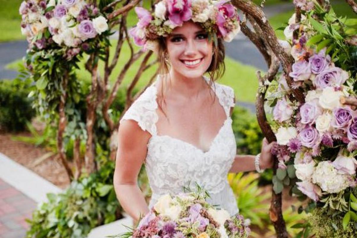 Bride with Floral Boutique Wedding Arch