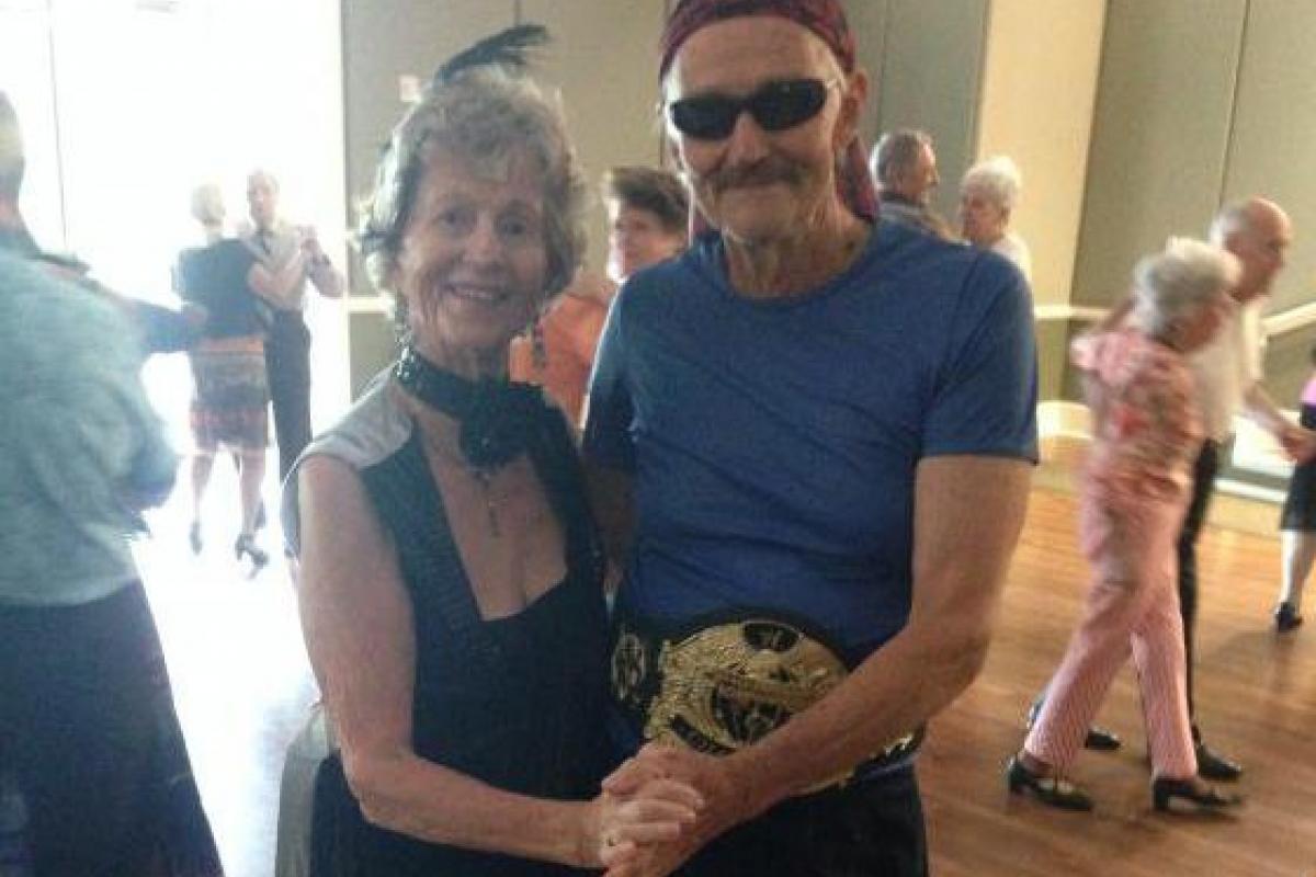 Couple in Costume Dancing